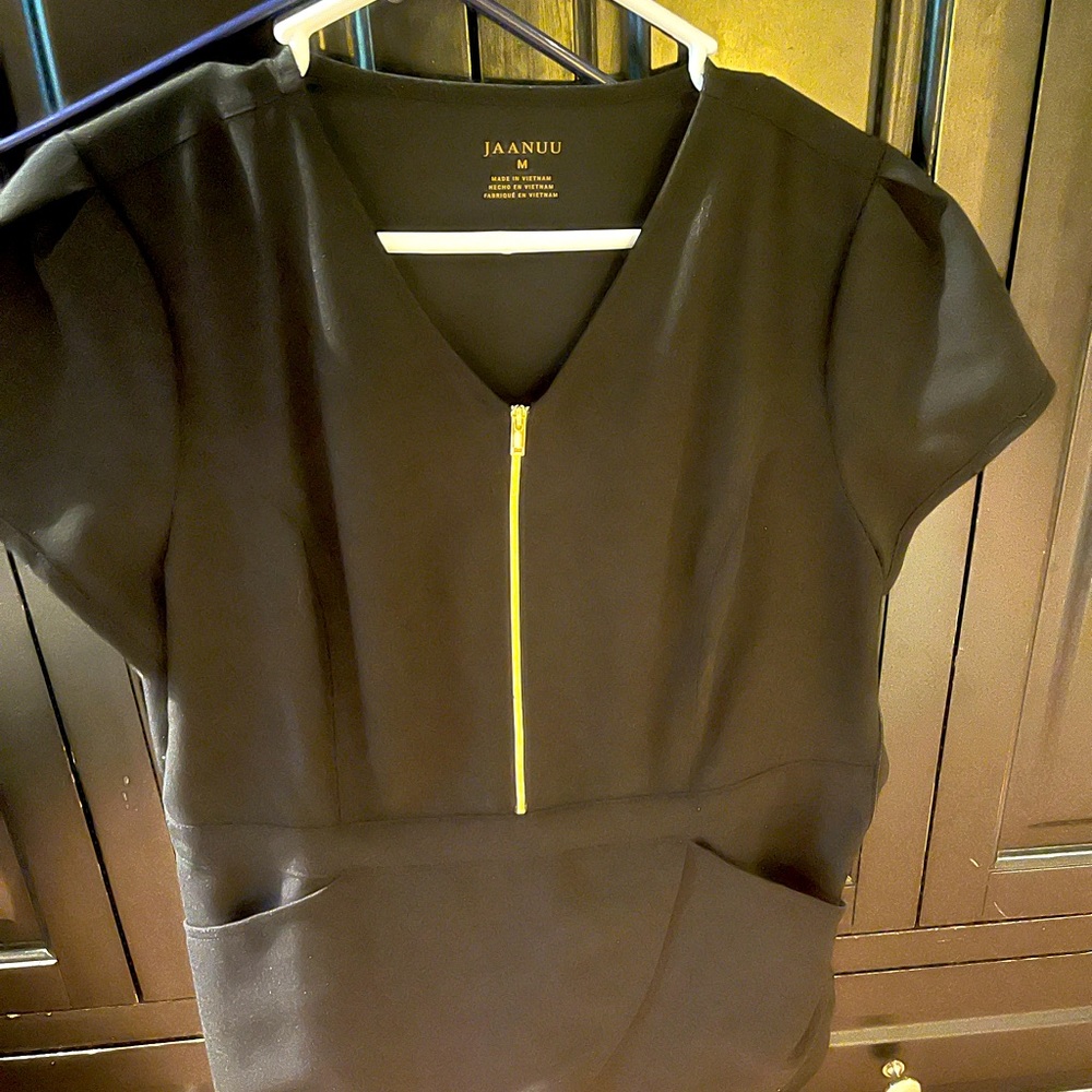 Jaanuu black scrub set with gold zippers. Size medium/medium petite